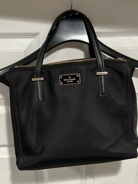 Kate Spade medium size hand bag in classic black fabric
